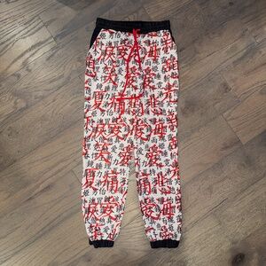 white character print joggers